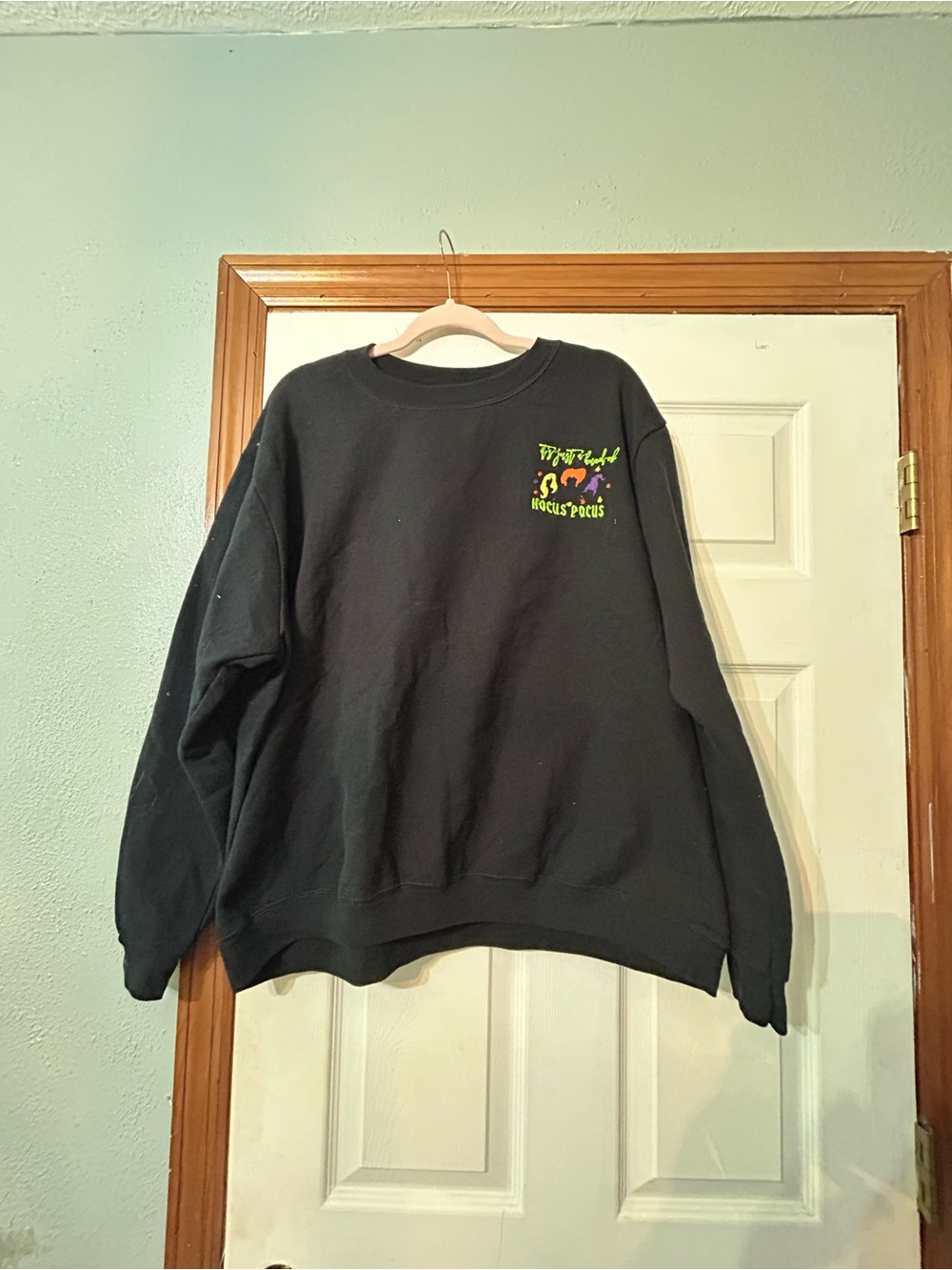 Black Crewneck Sweatshirt with Neon Hocus Pocus Graphic